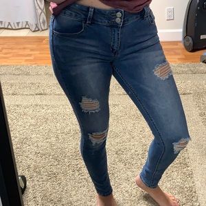 Blue stretchy denim distressed jeans. Mudd brand, girls size 16.